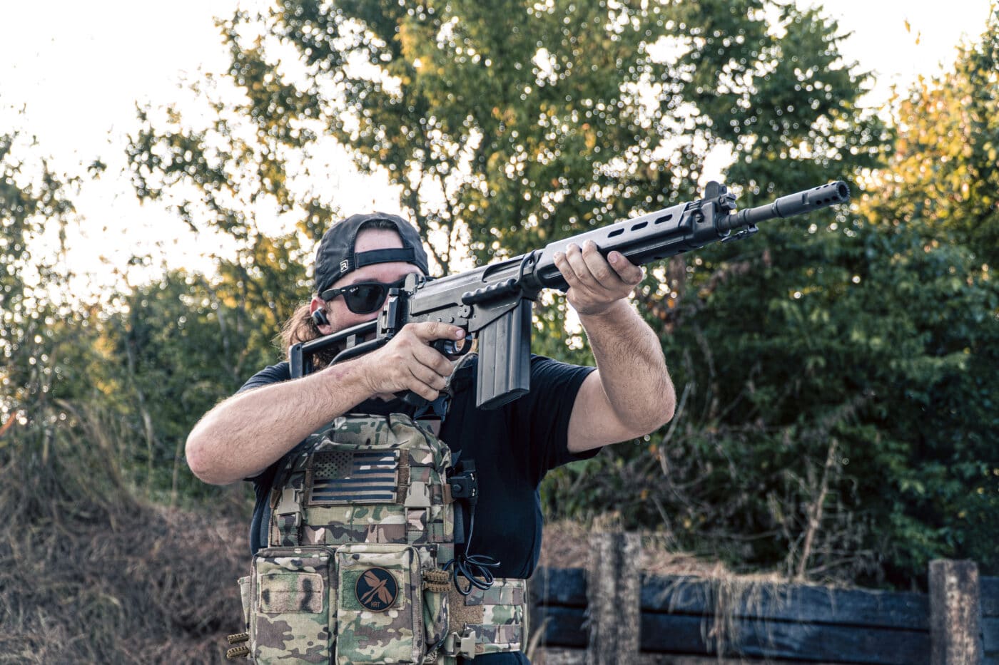 Man testing a Springfield SAR-48 rifle