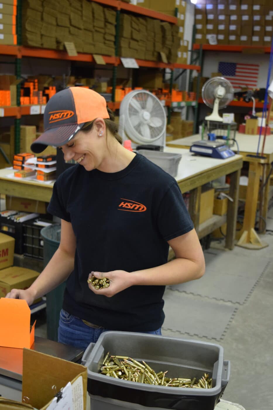 Woman inspecting ammo at HSM Ammunition factory