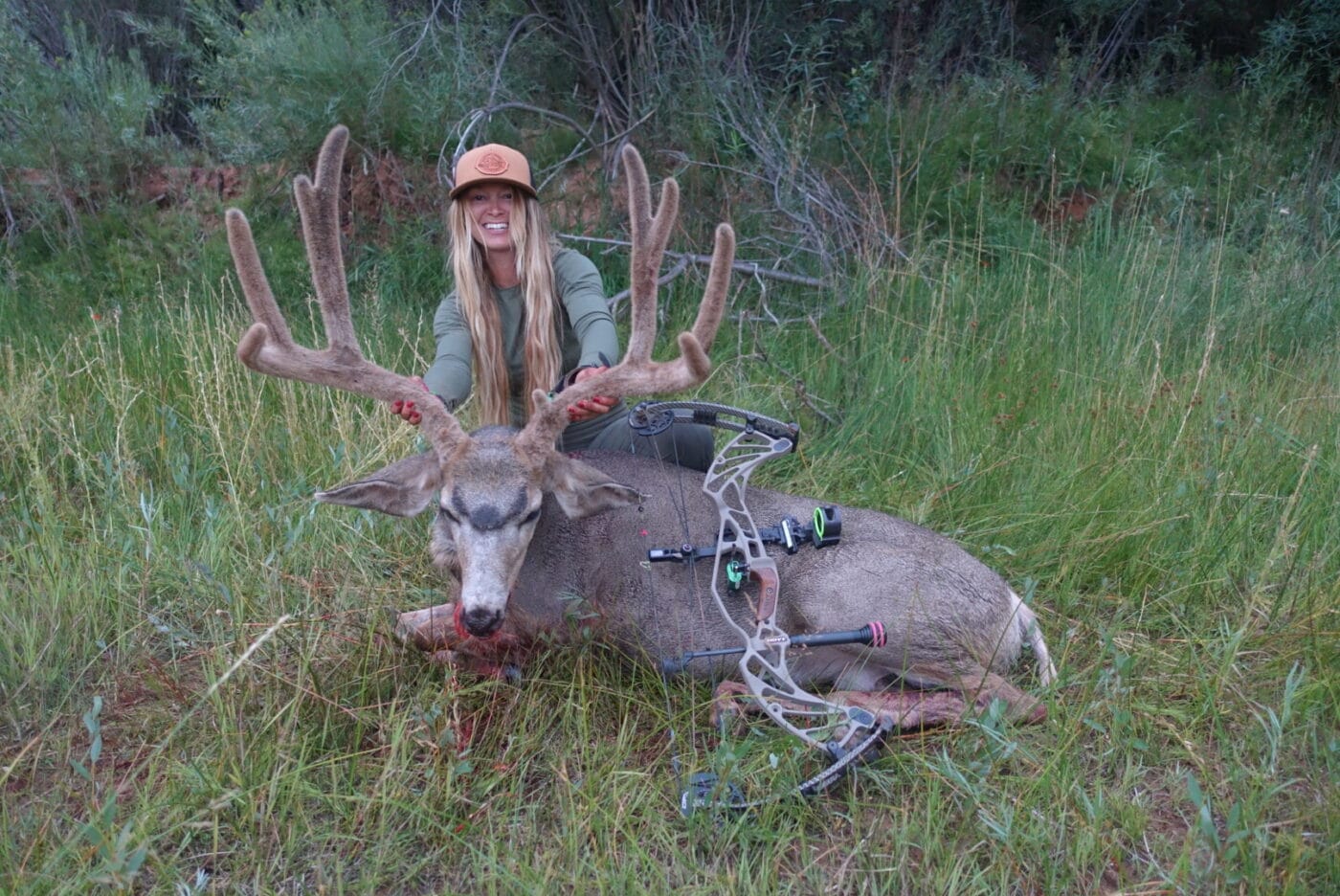 Bridget Fabel with a deer while hunting