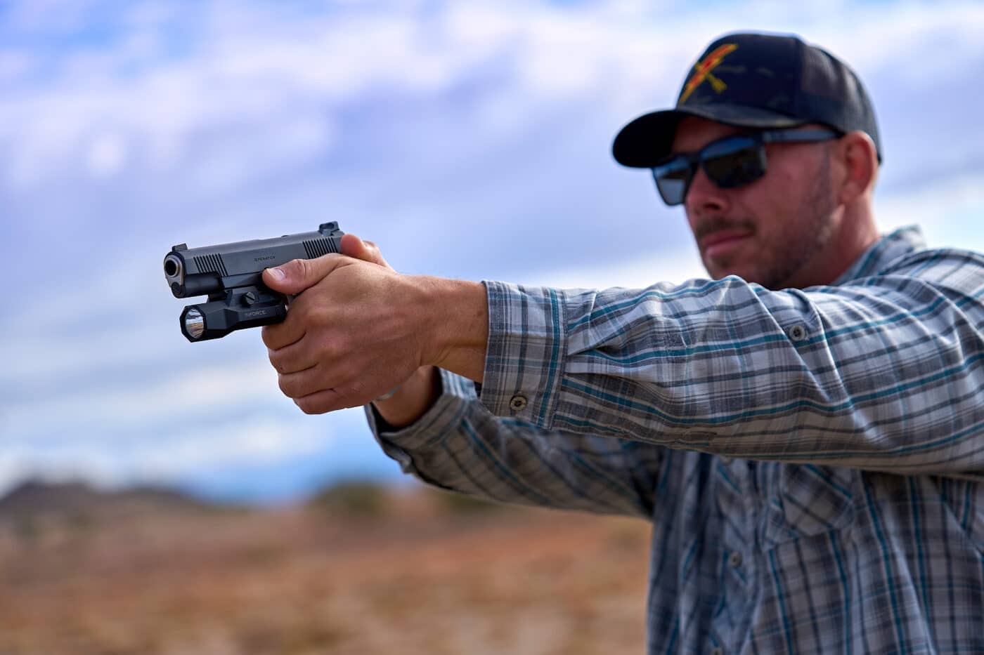 Man testing the Springfield Armory Operator 1911 on the range