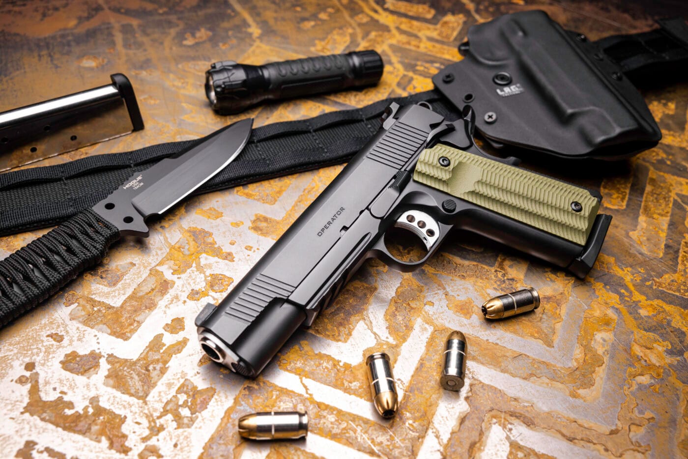 Defensive gear including 1911 pistol by Springfield Armory