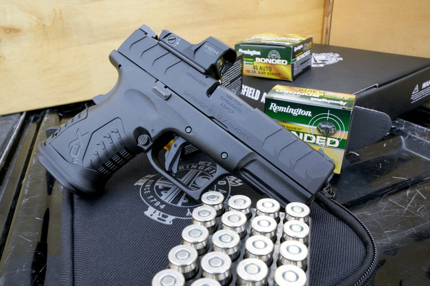 Springfield .45 XD-M Elite Compact OSP pistol with ammo