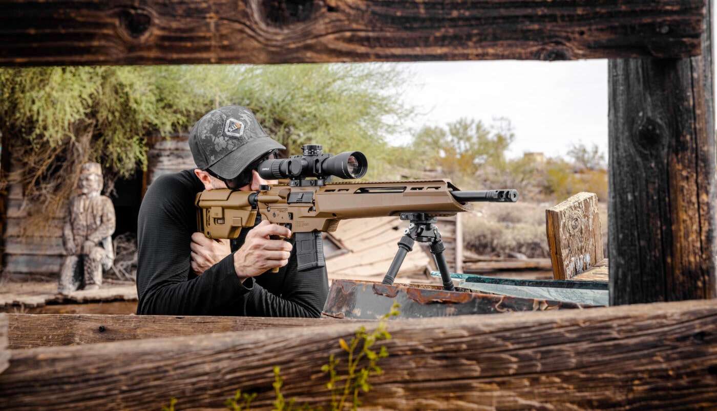 Man shooting the SAINT Edge ATC from the prone position