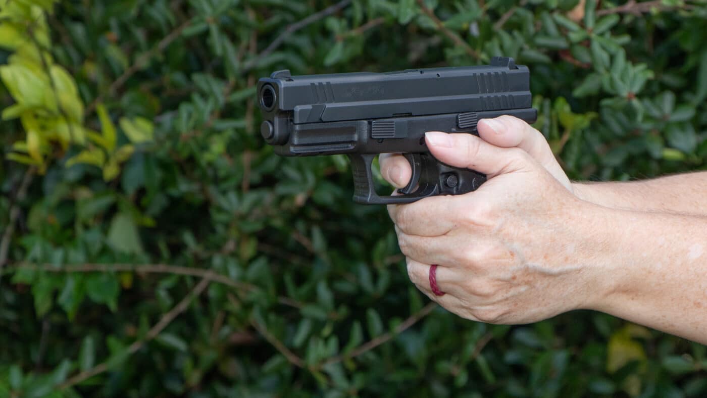 Man shooting an XD-40 pistol
