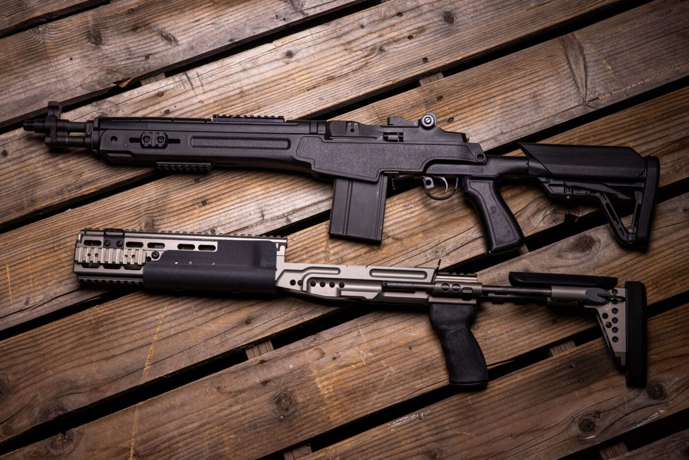 Aftermarket M1A stock shown next to Springfield M1A SOCOM 16 CQB rifle