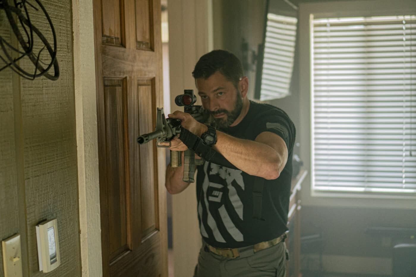 Man moving through the fatal funnel with an AR-15