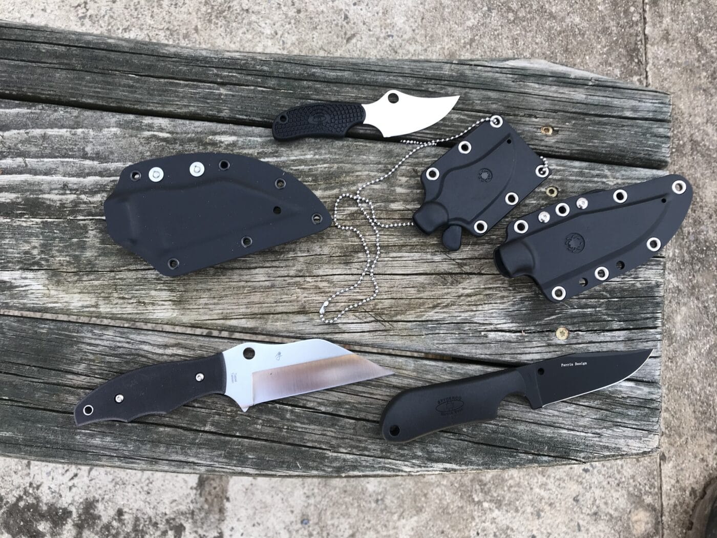 Various Spyderco fixed knives for gun defense