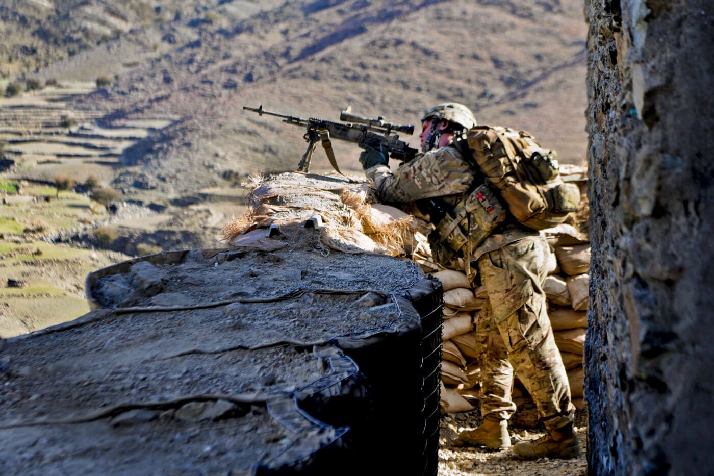 U.S. soldier in combat with M14 in Afghanistan