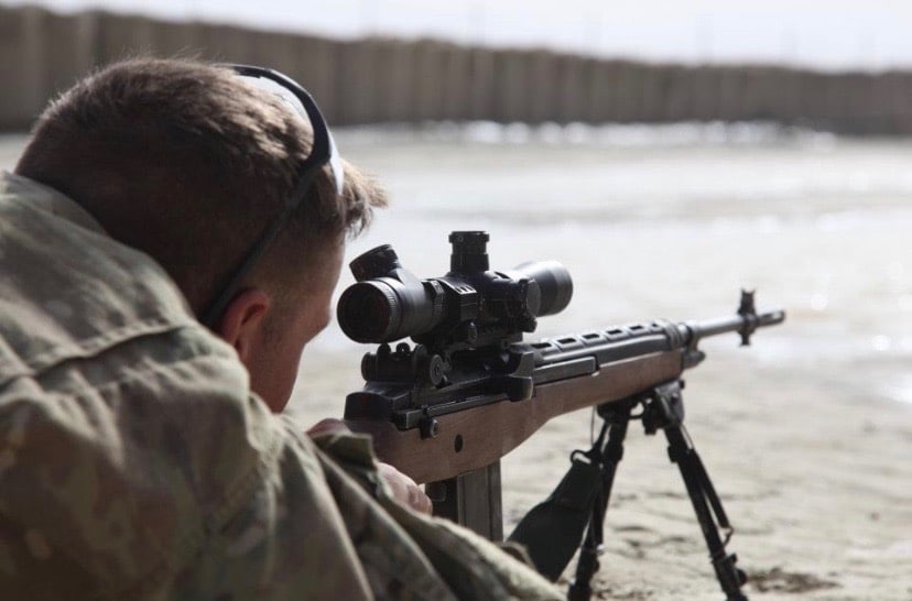 Soldier shooting M14 during the War on Terror