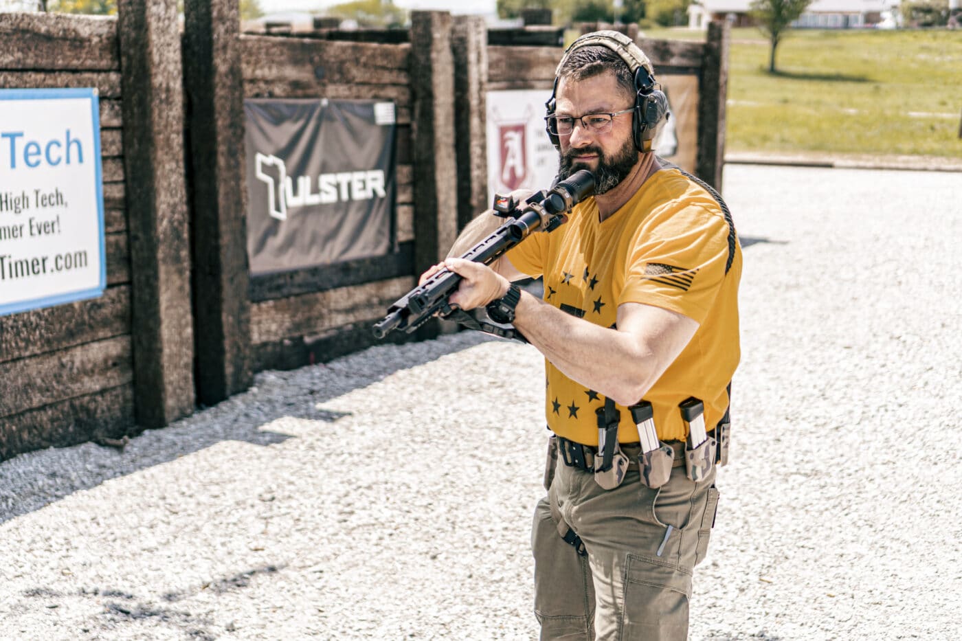 Man holding rifle in an over the shoulder position