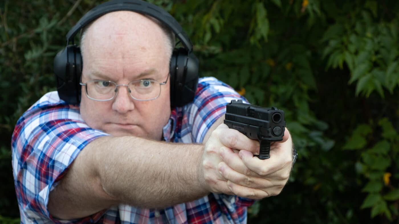 Man shooting a Springfield XD40 Sub-Compact pistol