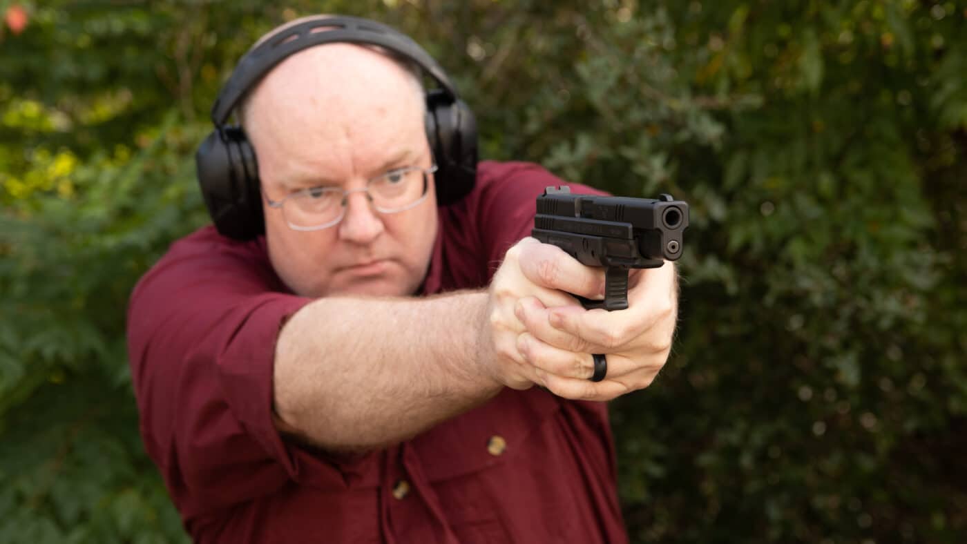 Author shooting the XD Tactical for the review