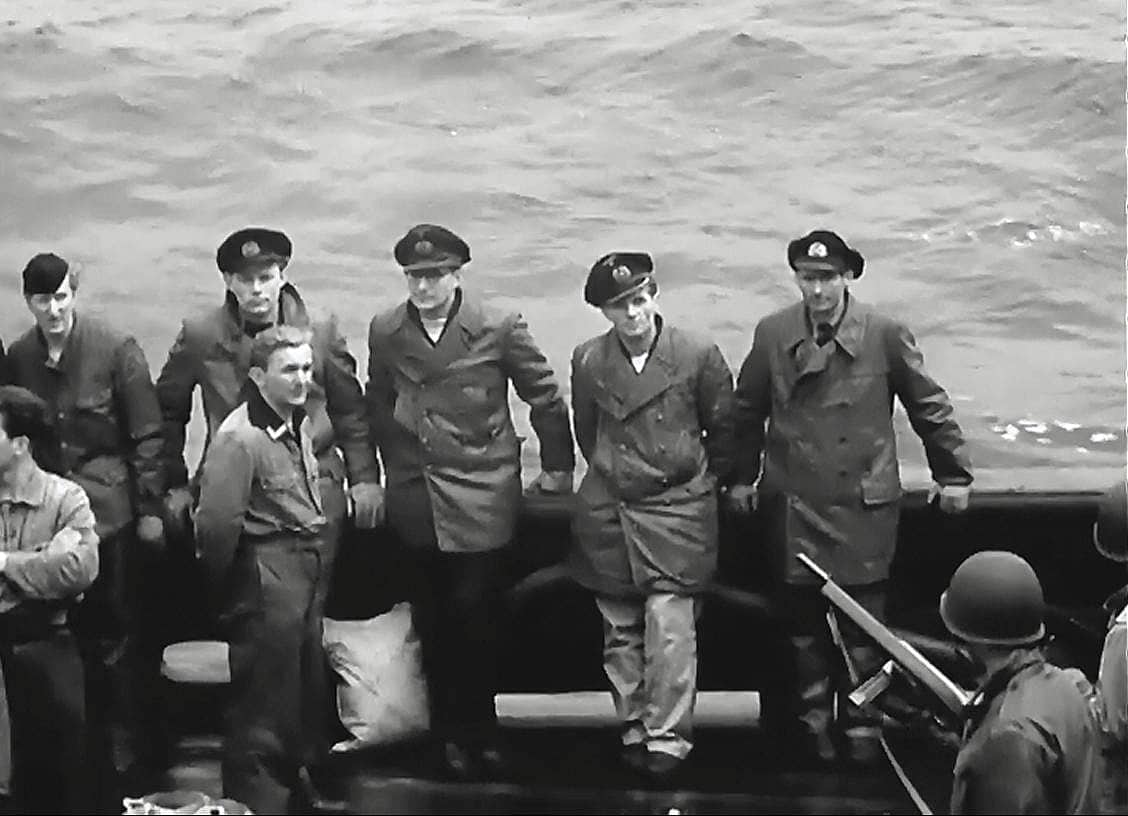 US Coast Guardsmen cover captured U-boat crewmen