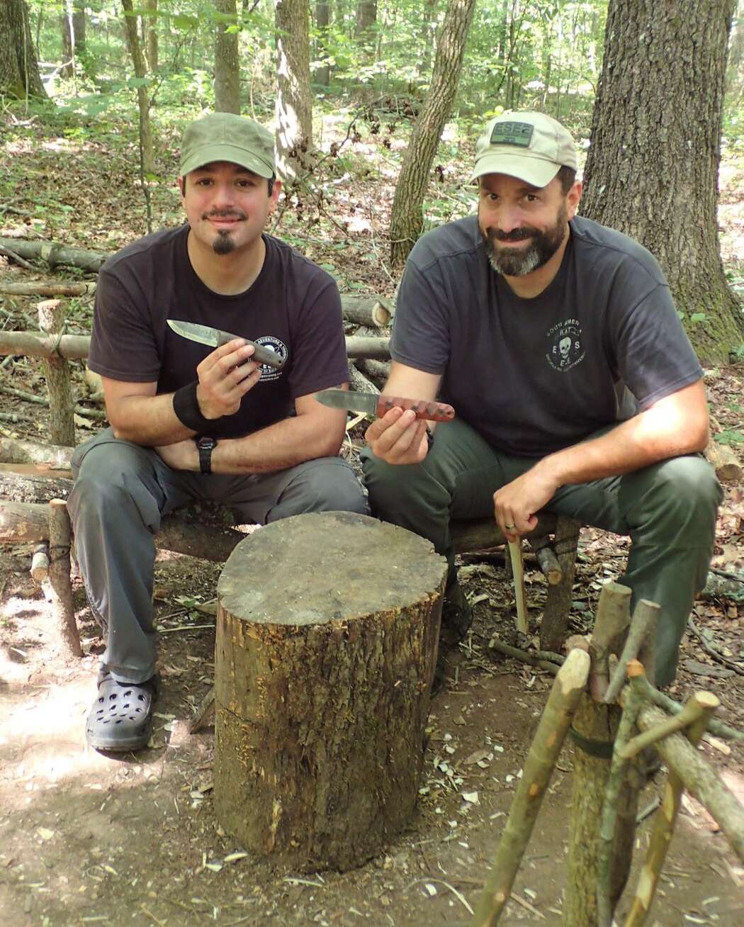 Reuben Bolieu and Patrick Rawlins holding ESEE knives