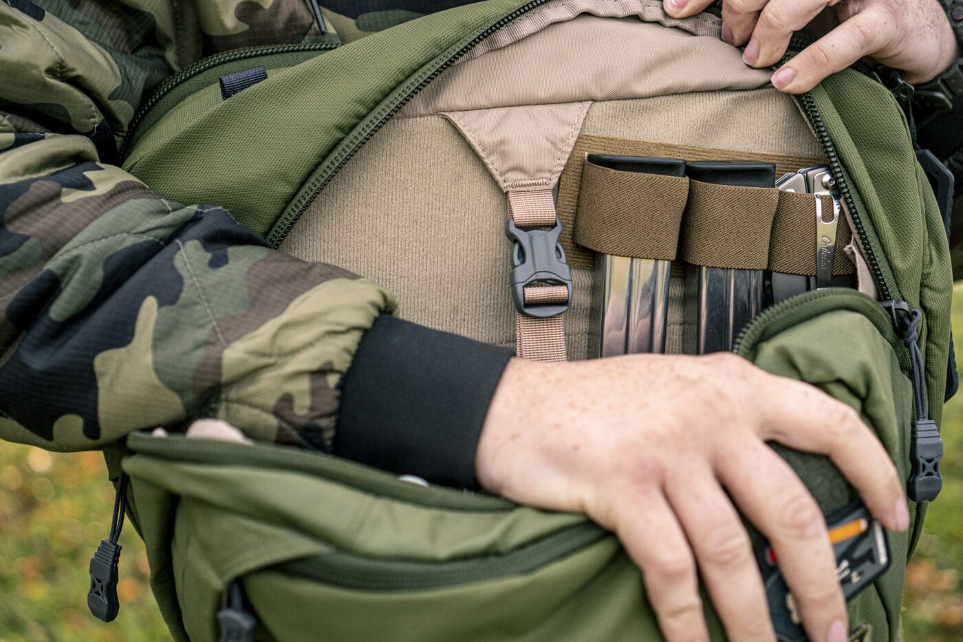 Man carrying gear in a Vertx Transit during testing