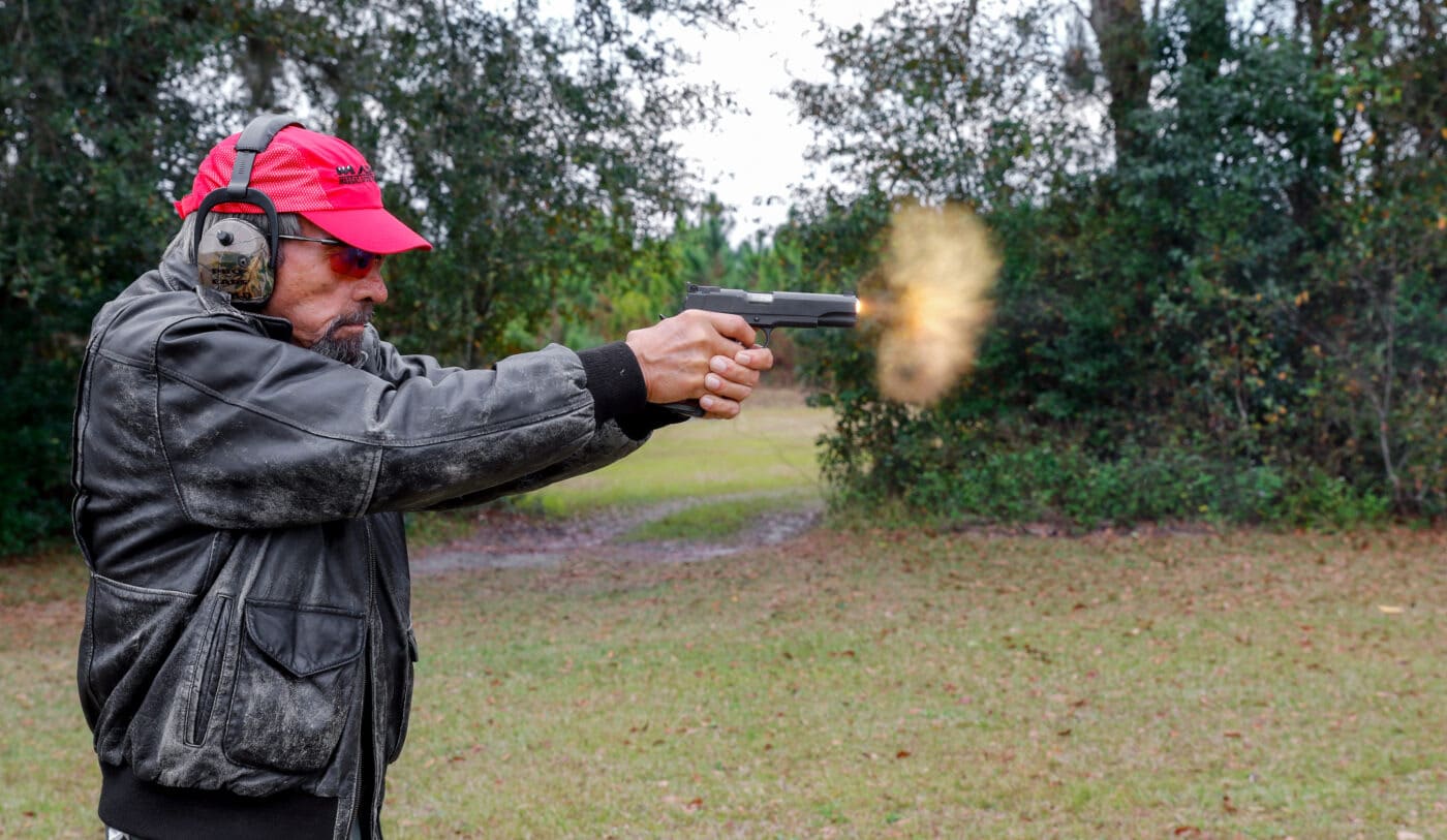 Massad Ayoob shooting a Springfield Armory 1911 in a Classic Weaver stance