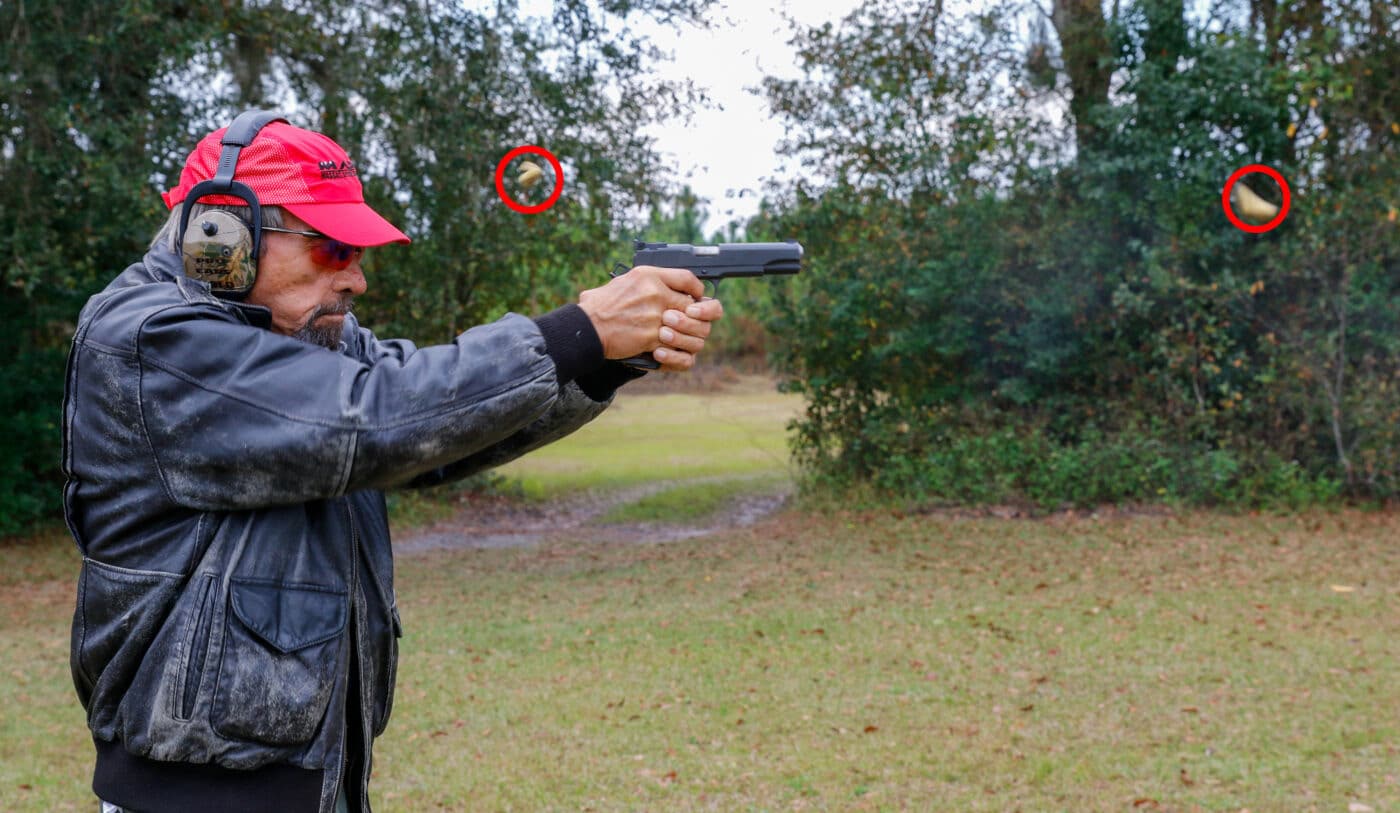 Massad Ayoob managing recoil with a proper Weaver stance