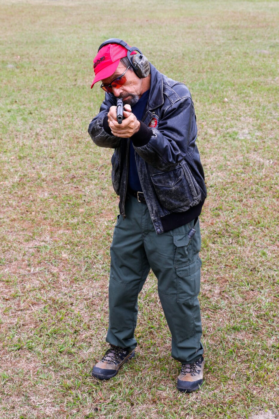 Massad Ayoob showing cross-dominant eye shooting with Weaver stance