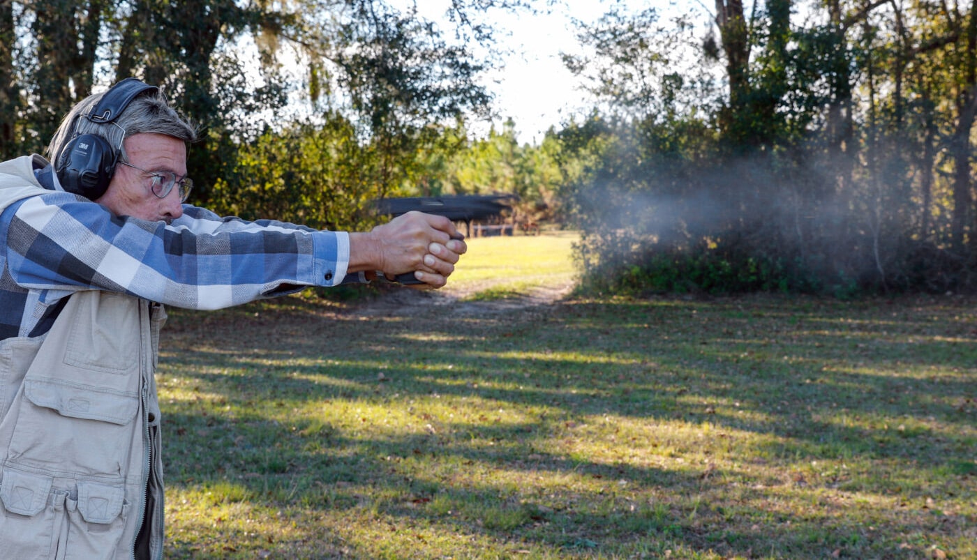 Massad Ayoob testing the competition trigger on his XD-M pistol