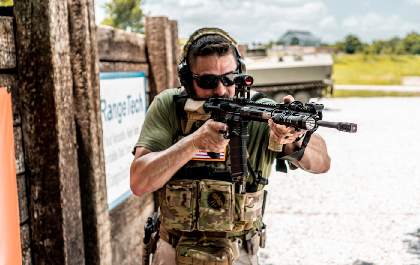 Man learning to use a rifle with a sling