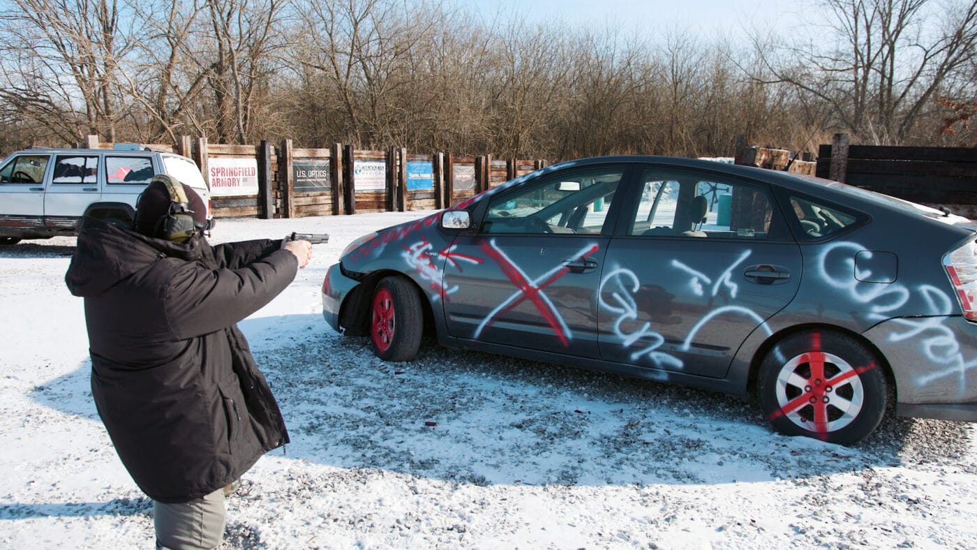 Man shooting a Toyota Prius