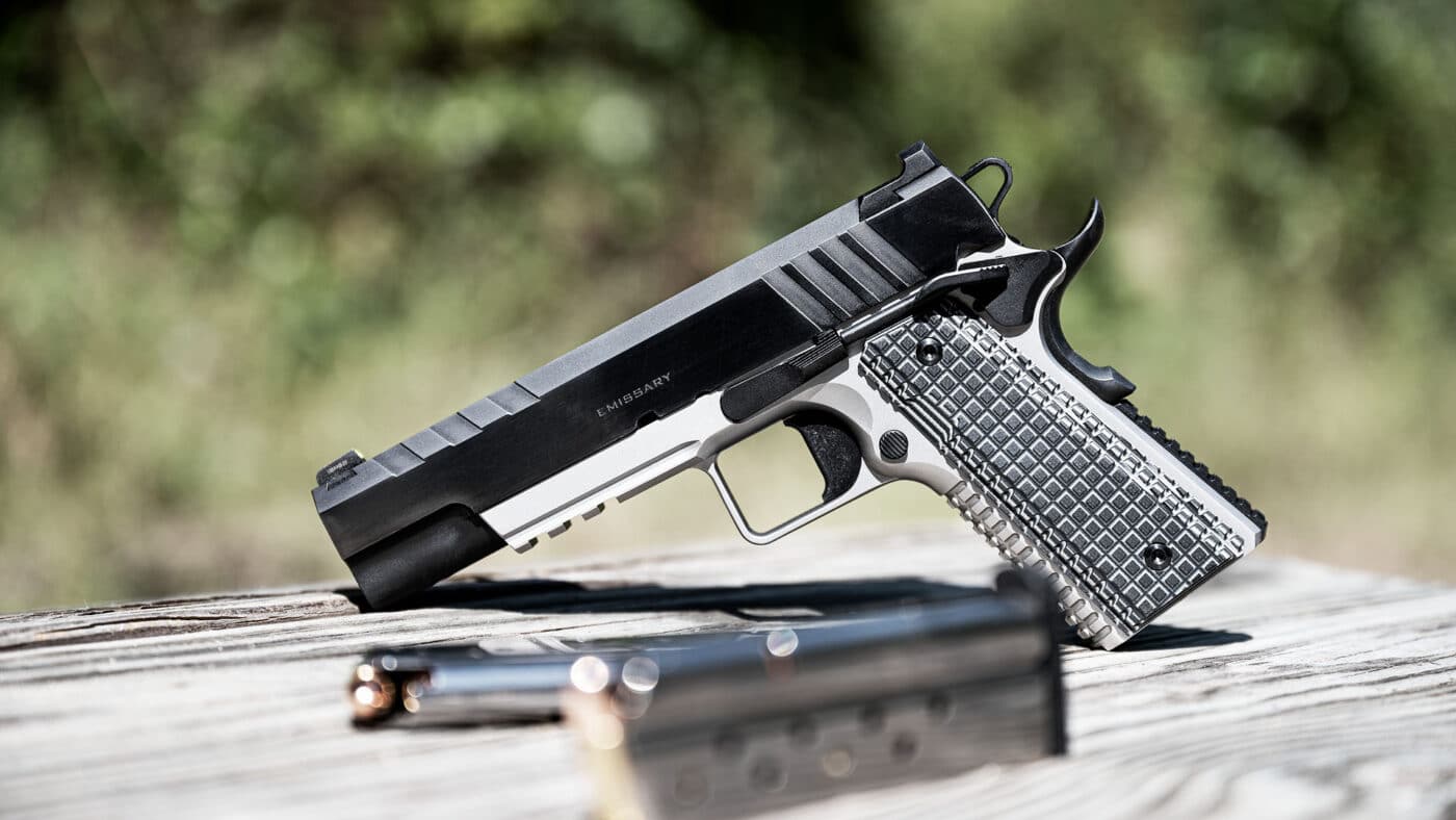 Springfield Armory Emissary 9mm pistol on a table with magazines