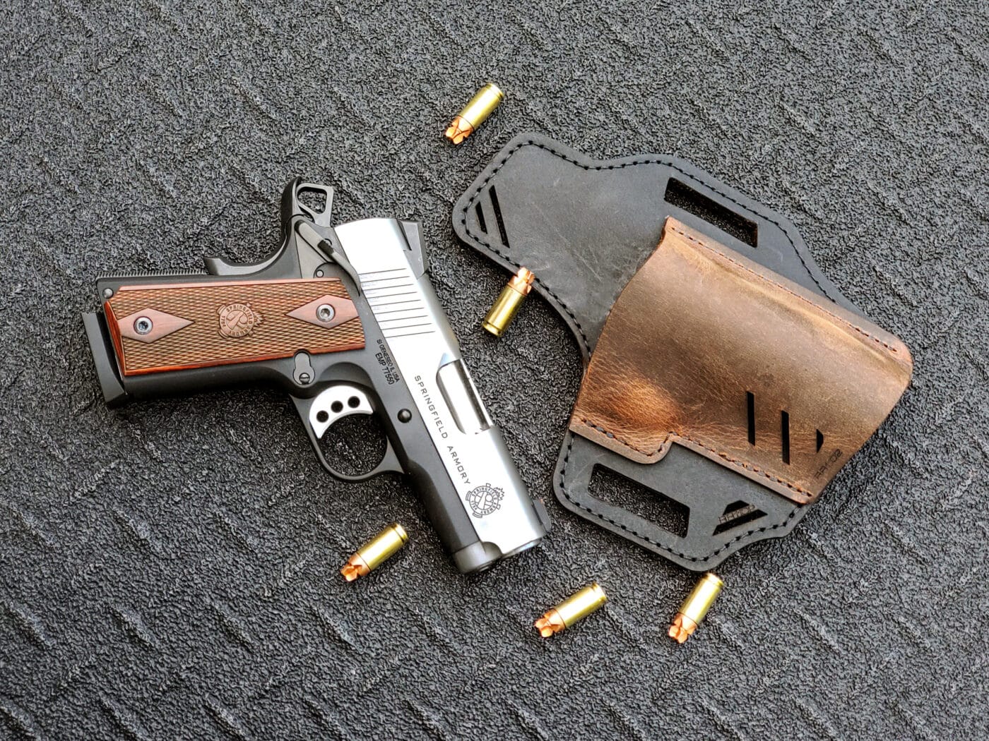 1911 pistol, handgun ammunition, and Verscarry Rough Rider holster