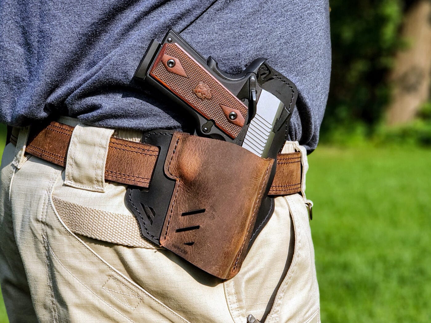Man wearing Versacarry holster with 1911 during testing