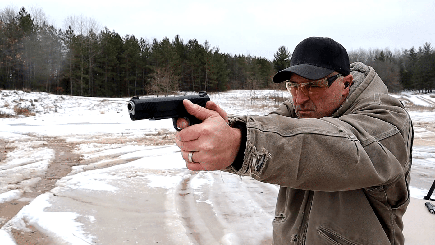 Man shooting the Springfield Armory Operator 1911 pistol