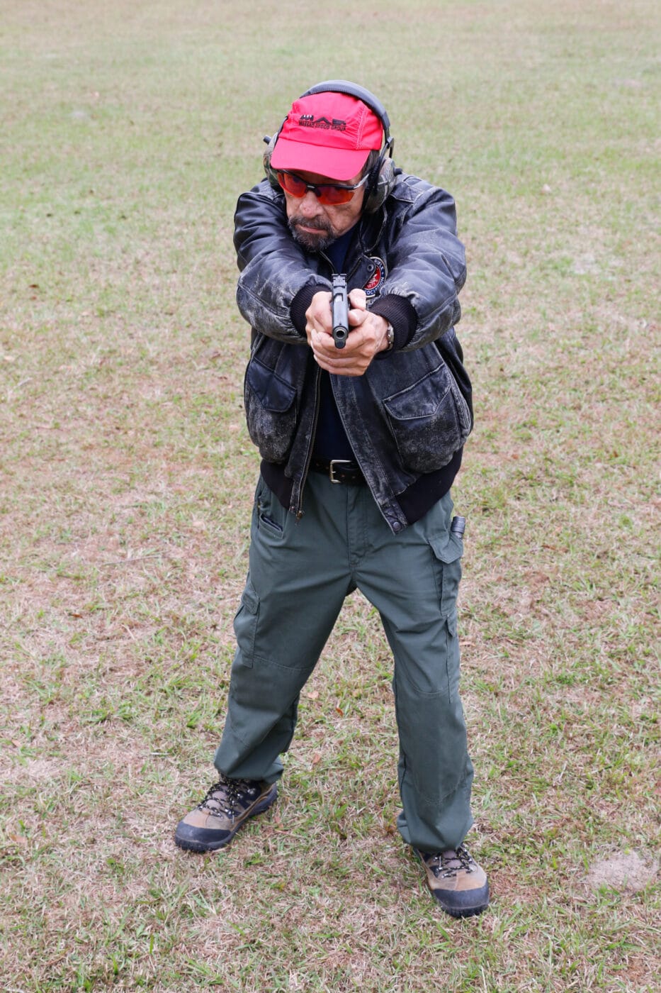 Ayoob demonstrating cross eye dominance shooting stance