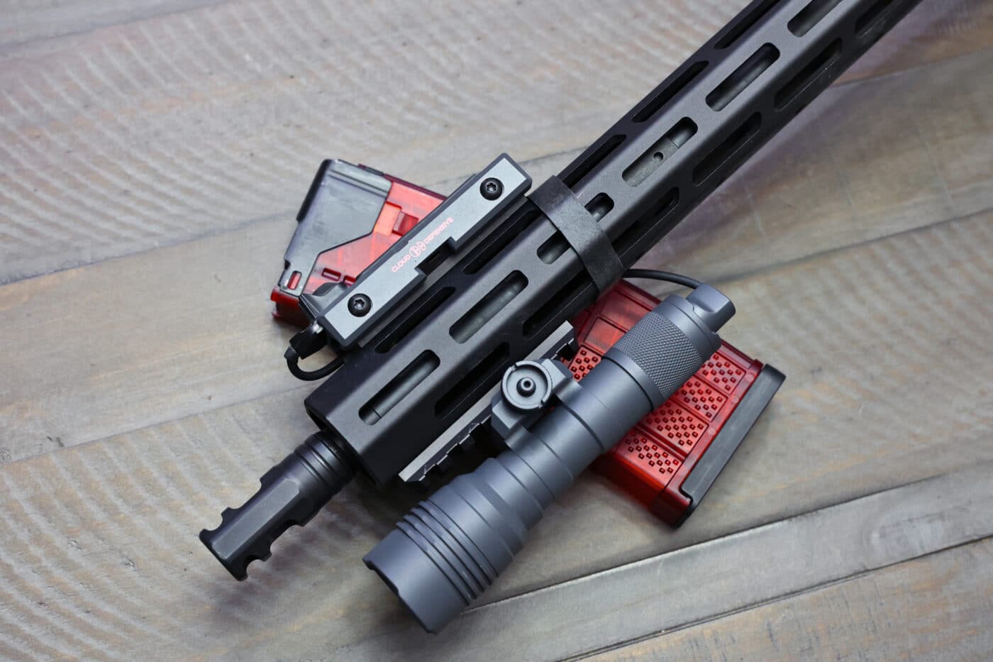 Streamlight HLX and Cloud Defensive LCS mounted on a SAINT rifle