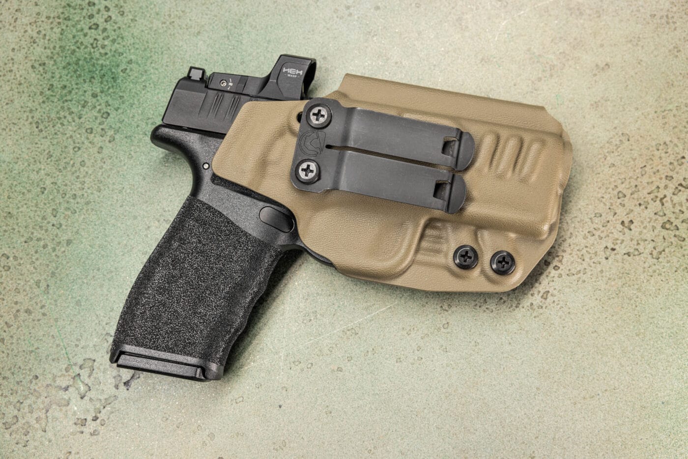 Springfield Armory Hellcat Pro pistol in a Black Arch Rev-Con holster