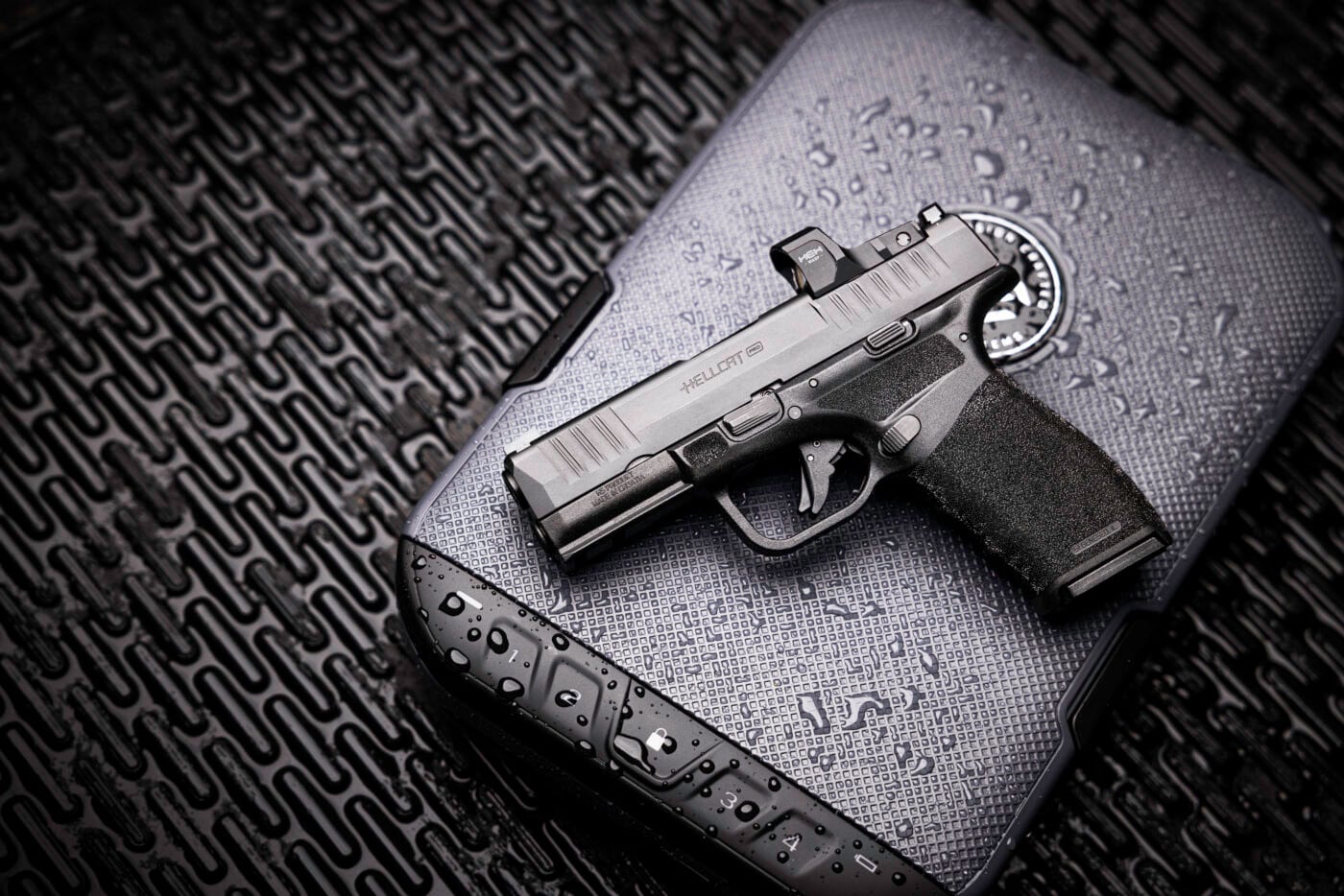 Springfield Armory Hellcat Pro pistol on top of a gun case