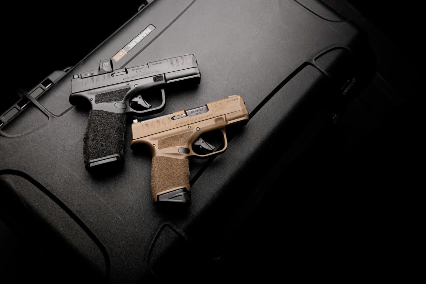 Springfield Armory Hellcat Pro next to regular Hellcat pistol