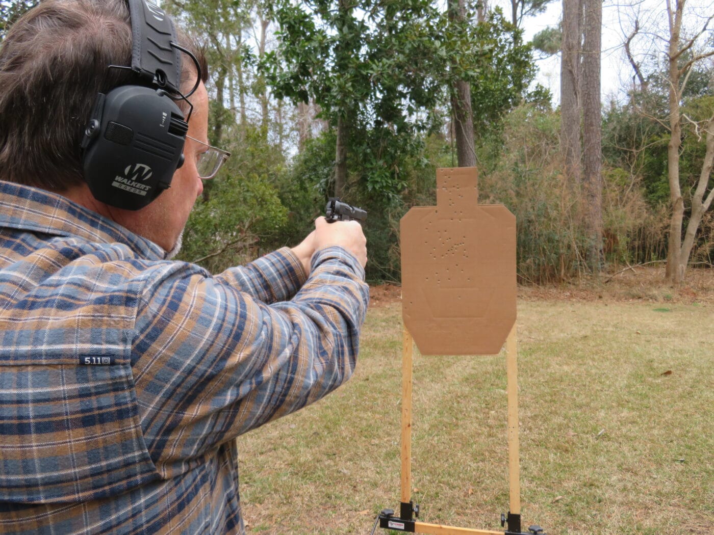 Man showing transition from chest to head with pistol