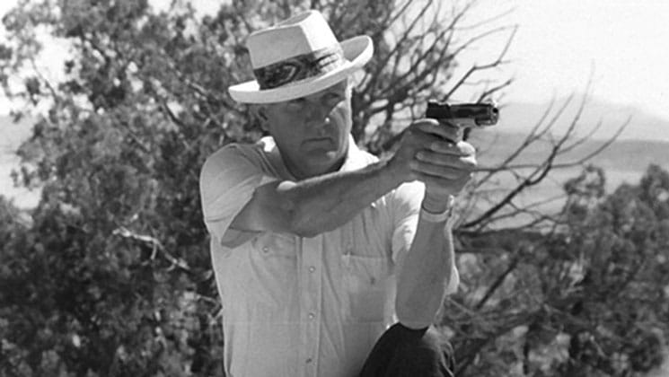 Jeff Cooper shooting a pistol
