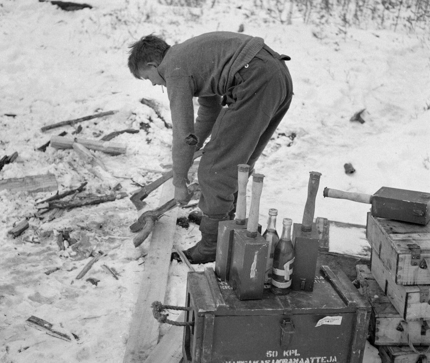 Molotov Cocktails and improvised explosive charges activated by a stick grenade