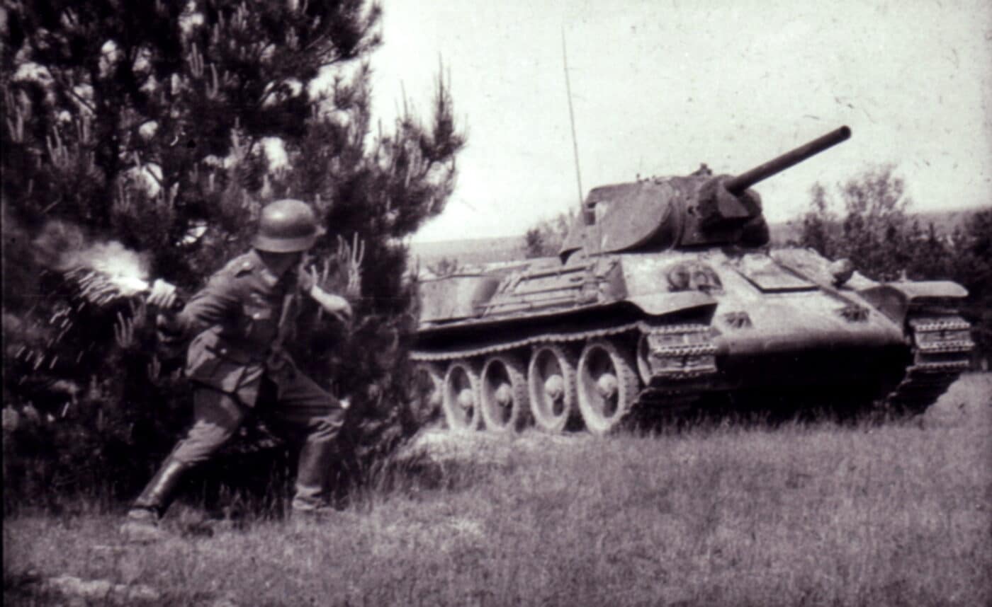 A still from a German anti-tank training film showing the use of a Molotov cocktail against a tank