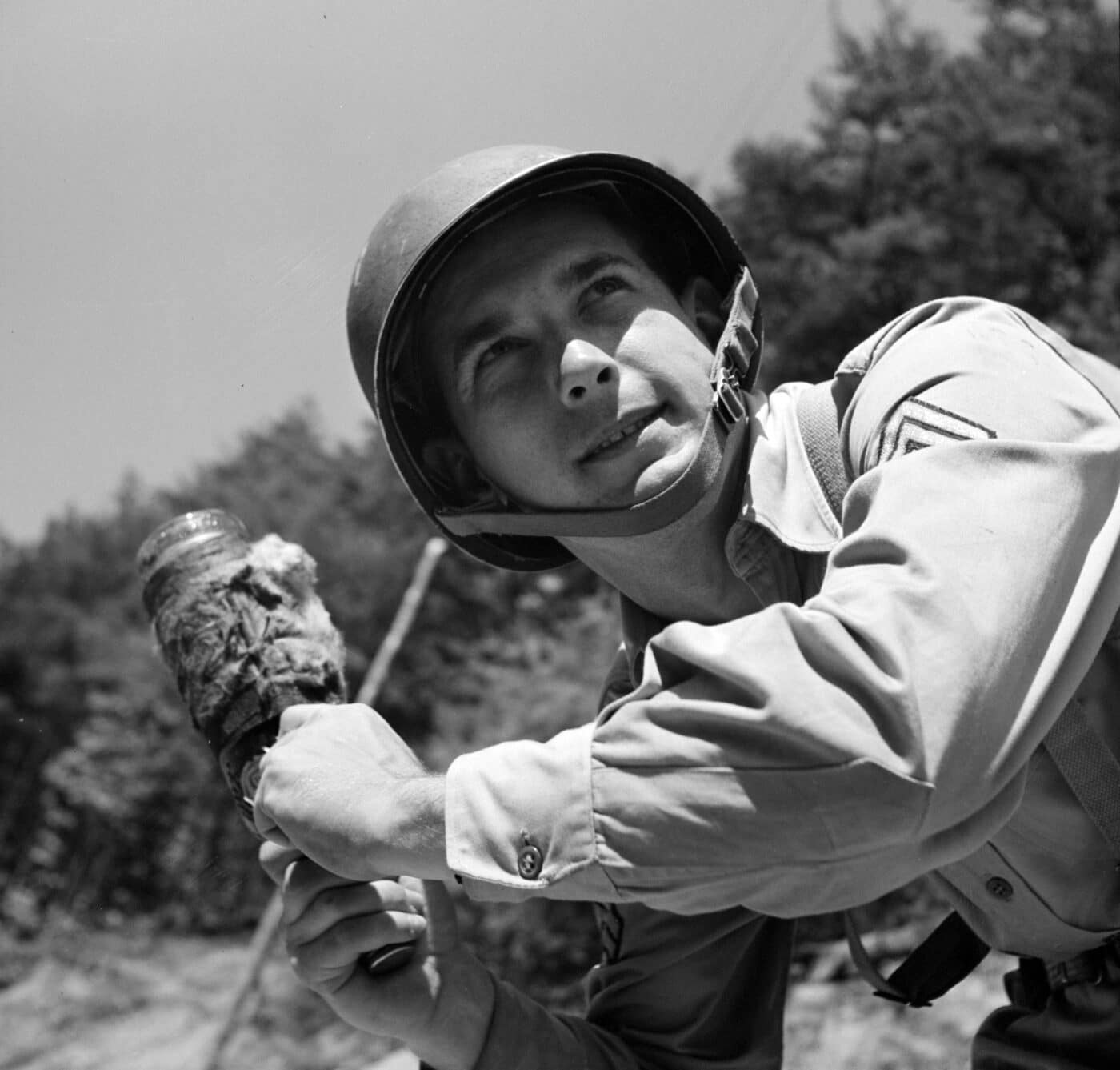 U.S. soldier training with a gas bomb at the Chemical Warfare Center during 1942