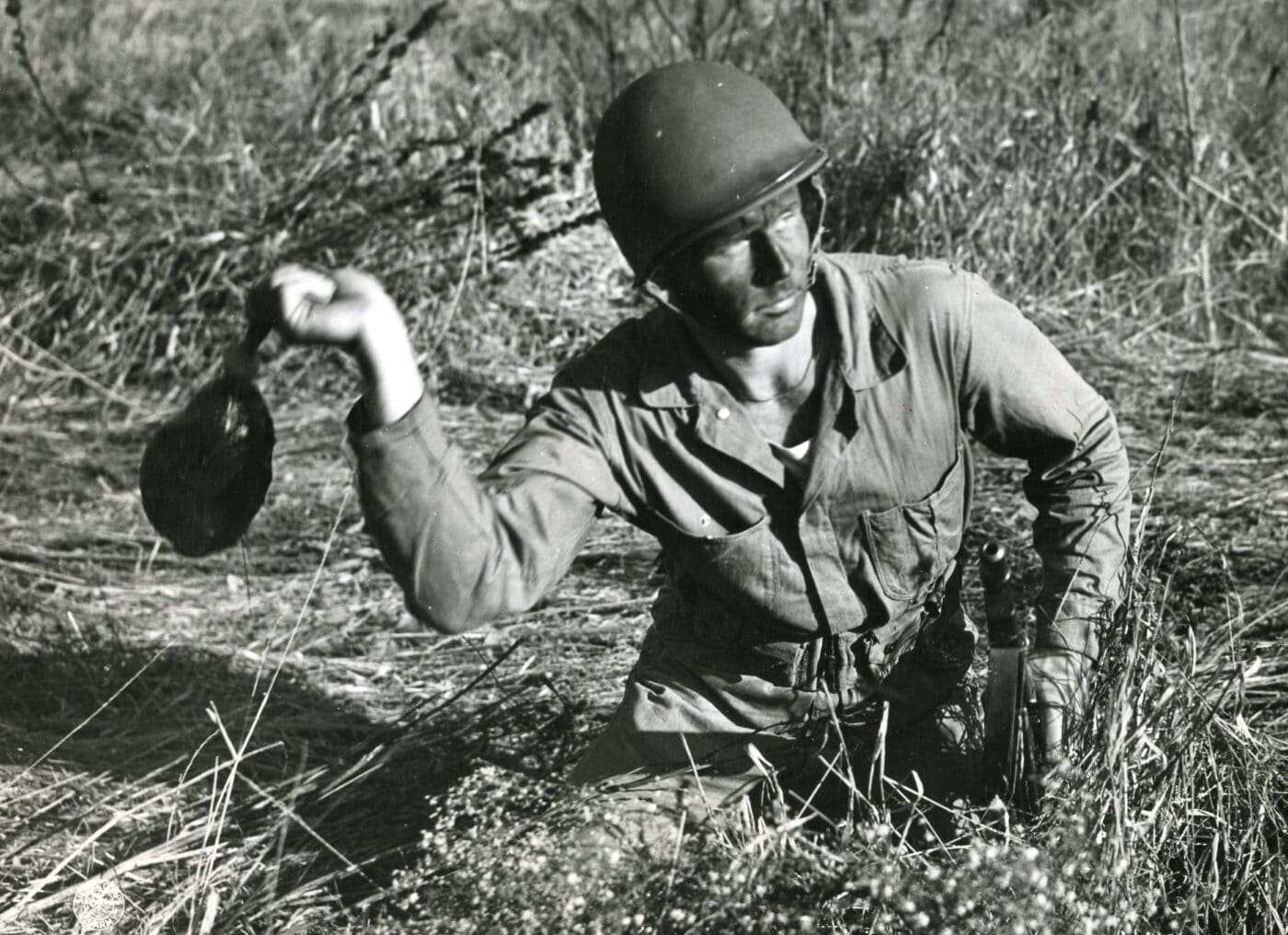 U.S. tank destroyer crewman training with a “sticky bomb” anti-tank grenade during 1943