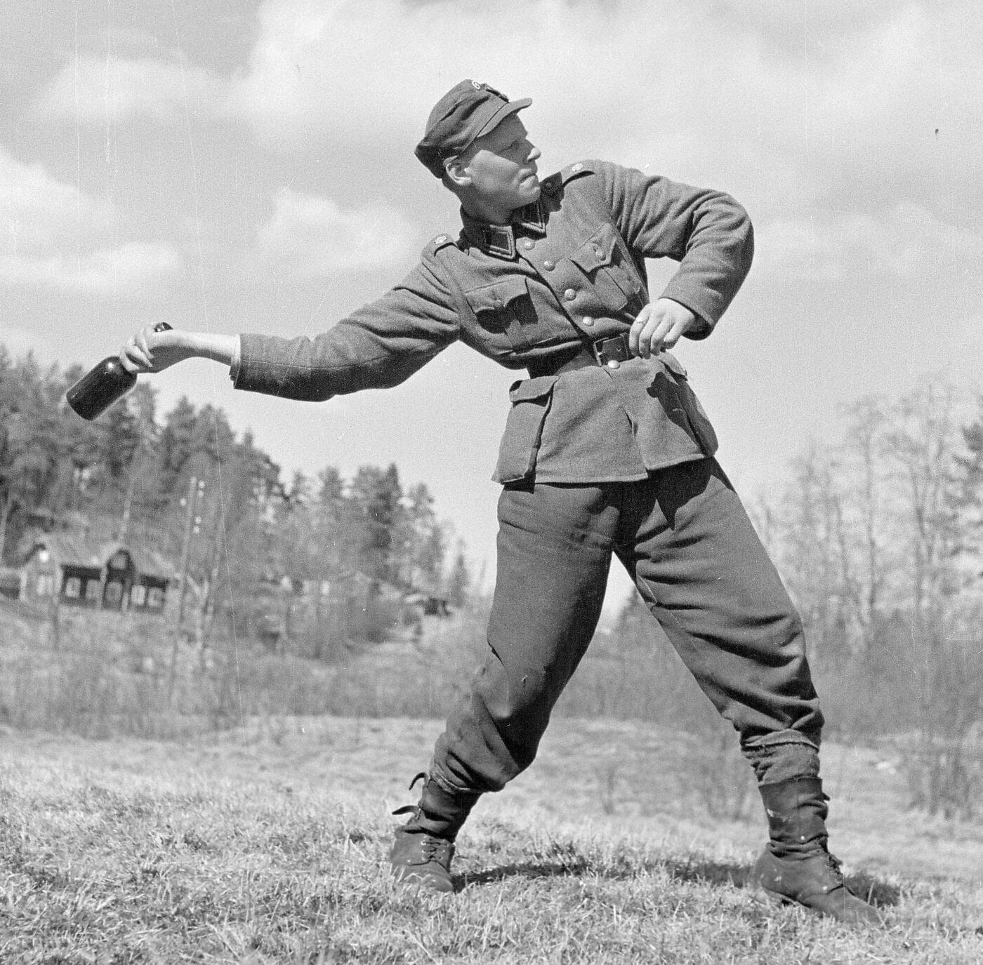 Finnish soldier showing the proper method for throwing a Molotov cocktail