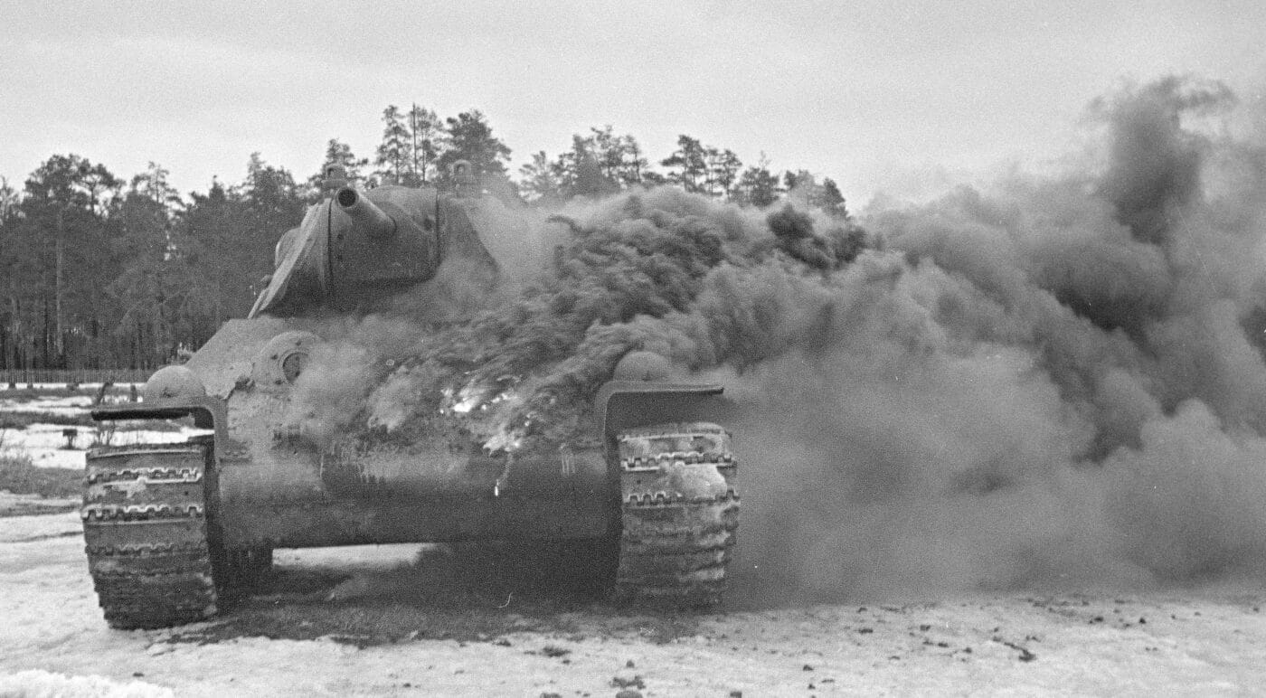 Molotov cocktail producing oily smoke after being thrown on a Soviet tank