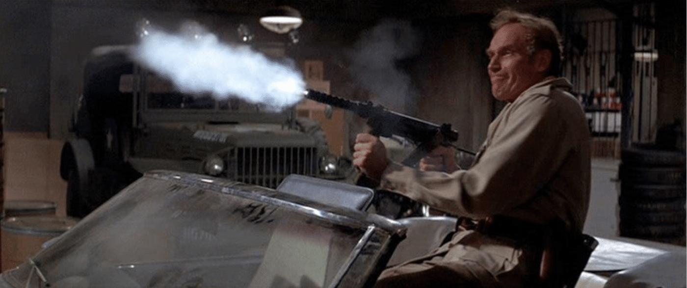 Charlton Heston firing an M76 SMG