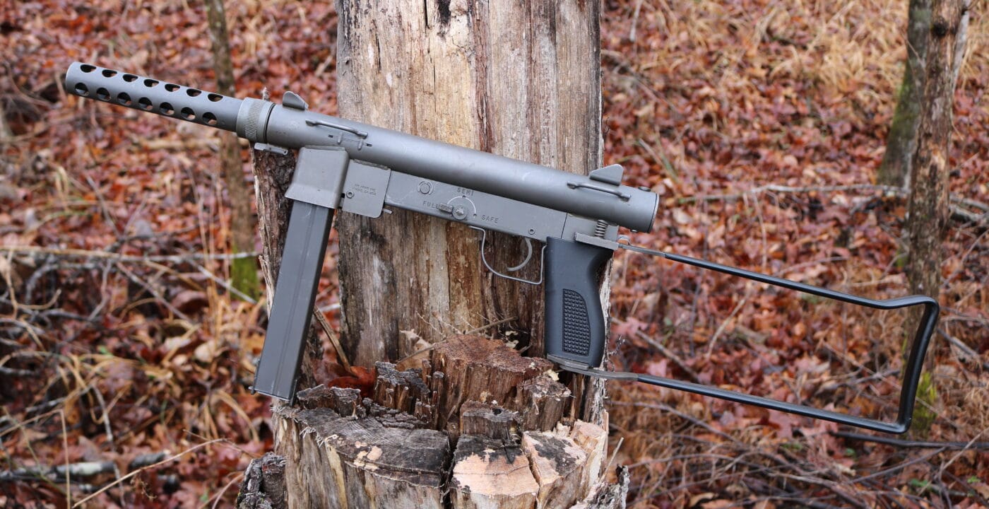 M76 submachine gun on a tree stump