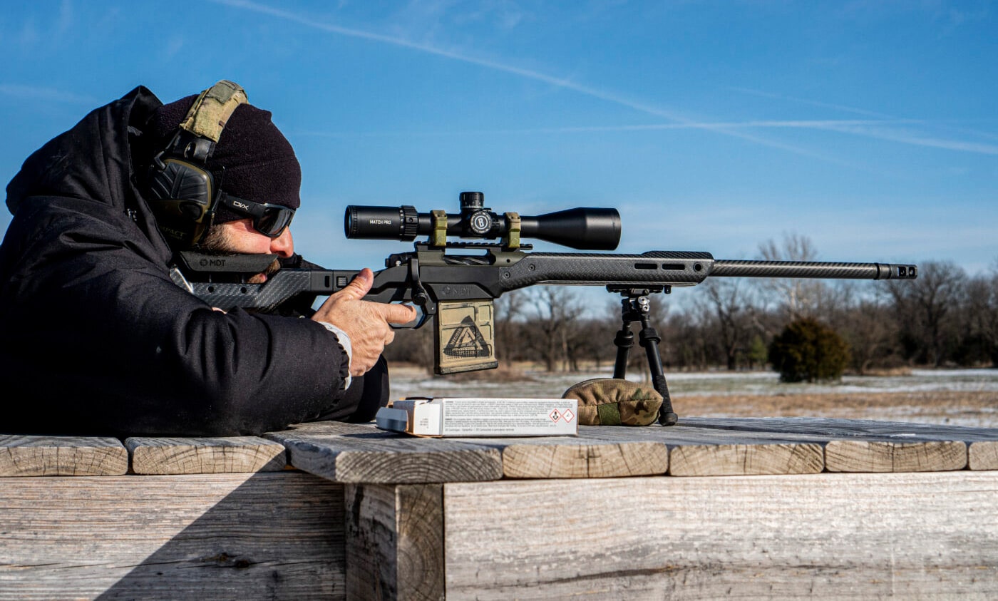 Man shooting Waypoint rifle with Bushnell Match Pro rifle scope