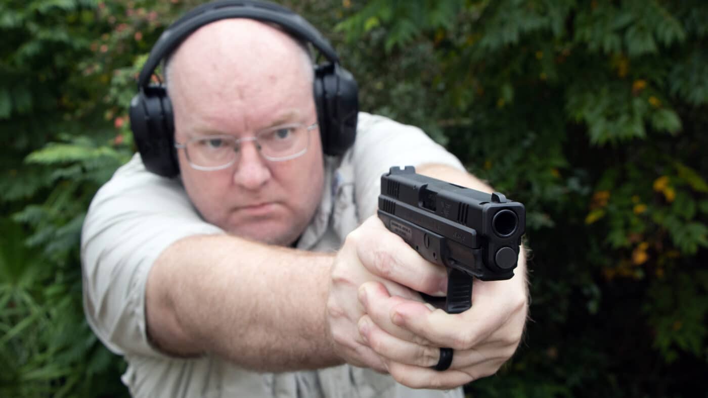 Author shooting the Springfield XD45 Compact on the range