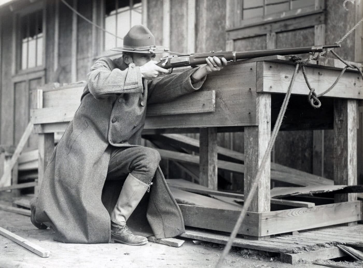 Soldier posing with Krag rifle at Camp Dix in New Jersey