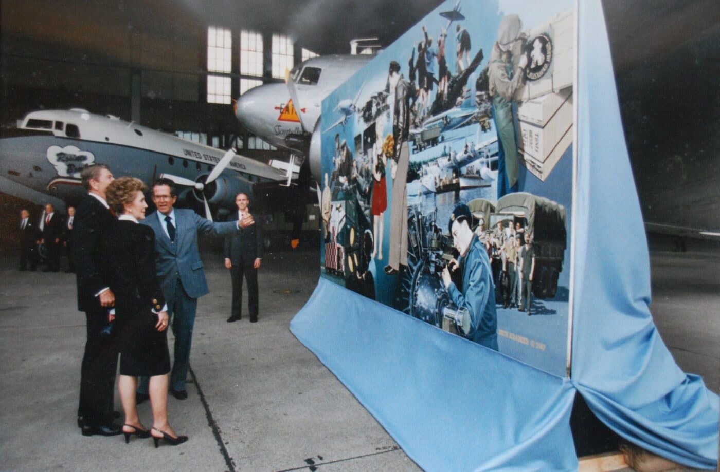 Dick Kramer presenting his Berlin Airlift art to Nancy and Ronald Reagan