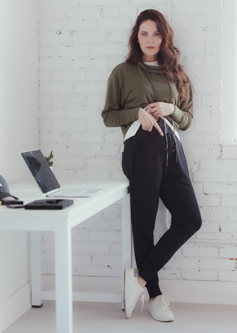 Amy Robbins founder of Alexo Athletica modeling the Terry CC Lounge Pant and Terry Cowl Hoodie products