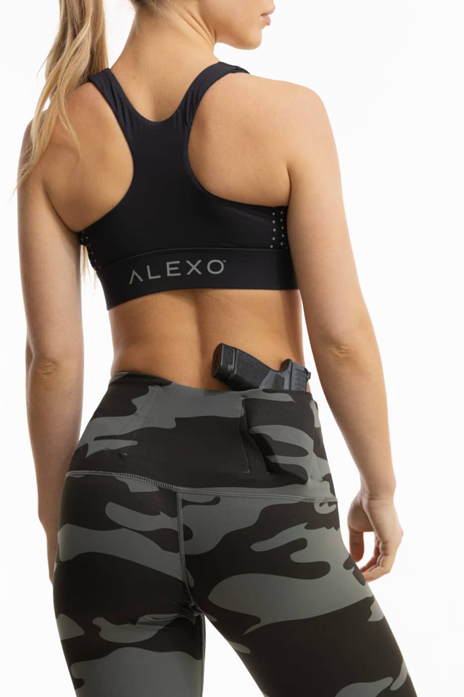 Woman modeling Full-Length Legging in camo from the Alexo Athletica x Springfield Armory collection